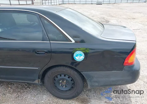 2001 Toyota Avalon Xl z USA, uszkodzony, nr VIN 4T1BF28B61U191292